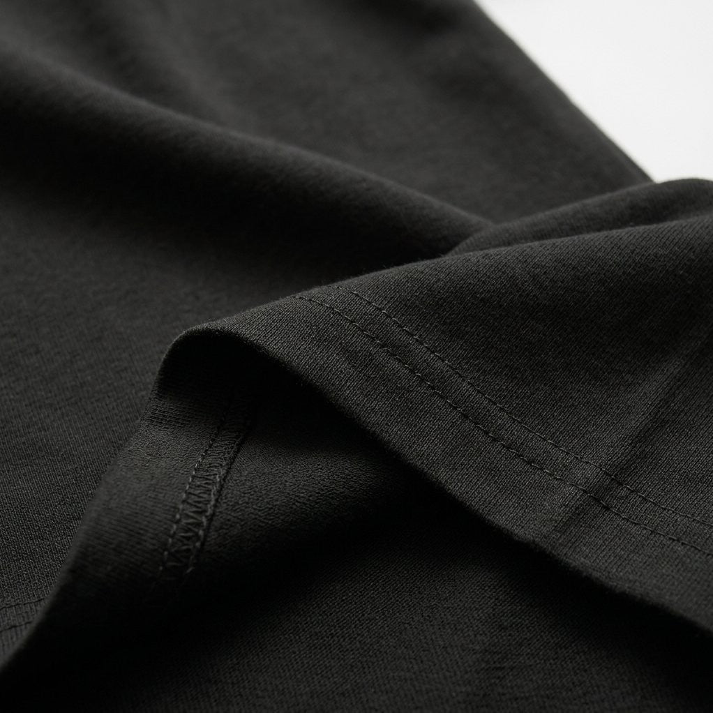 Dense cotton jersey and double-stitched hem, close-up