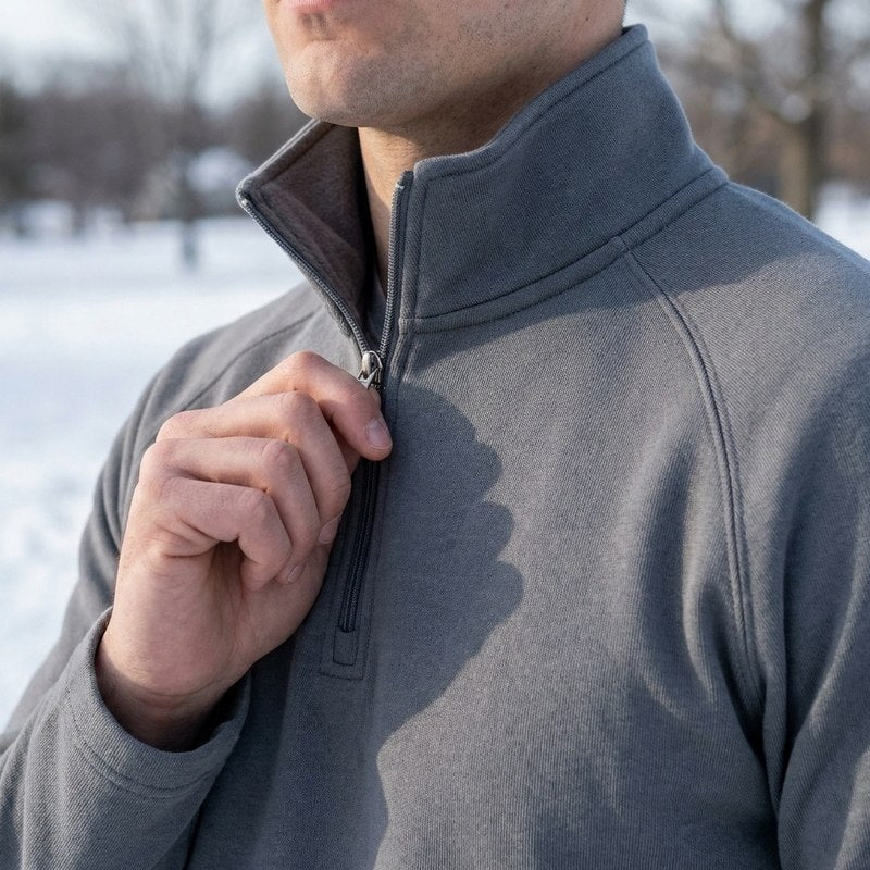 Close-up of the Darkwave Regal Pullover Sweater in Gray: ribbed stand collar, silver-tone quarter-zip and the soft brushed inside of the collar